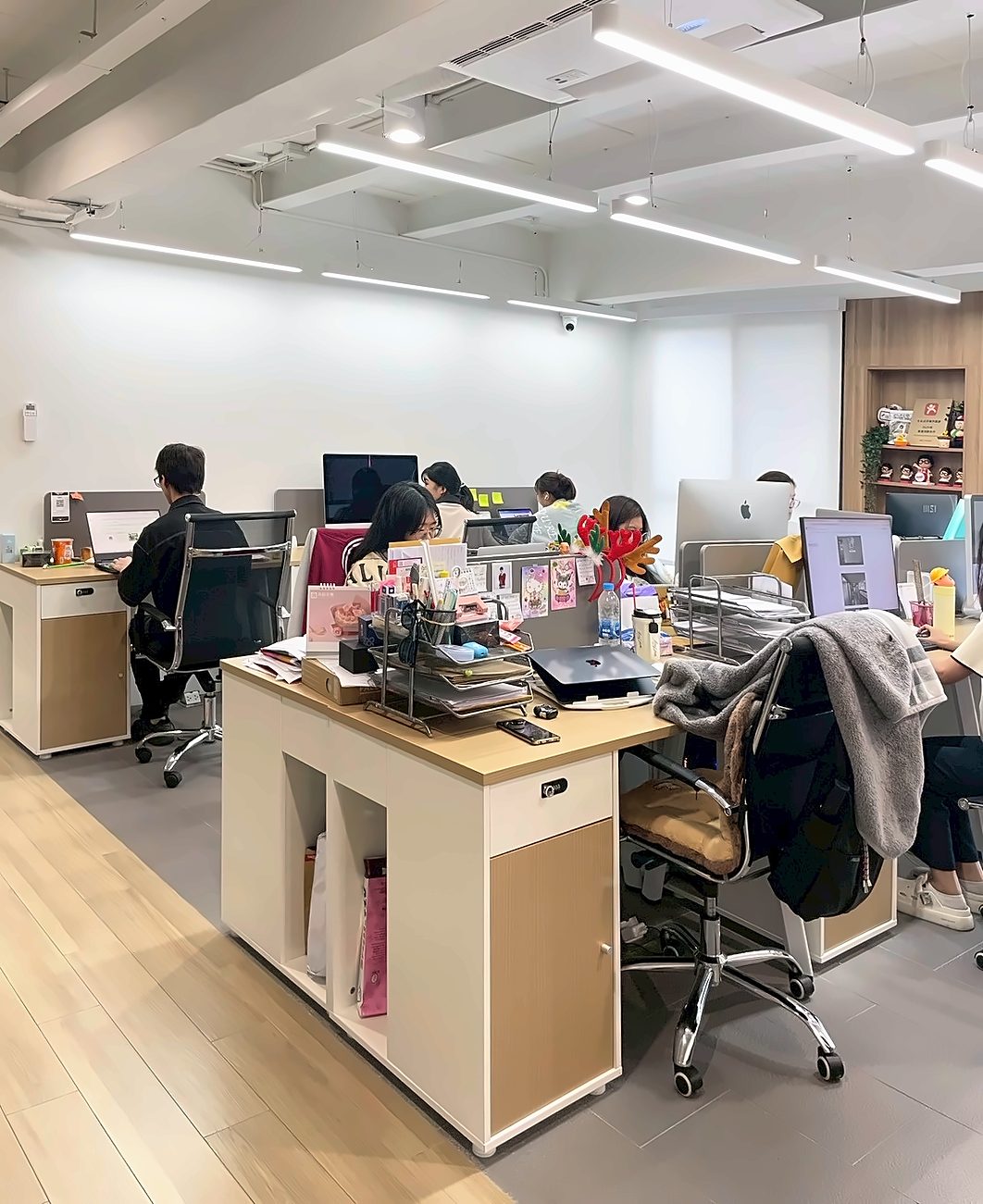 Klick Digital team working at their desks in the open-plan Bangkok office